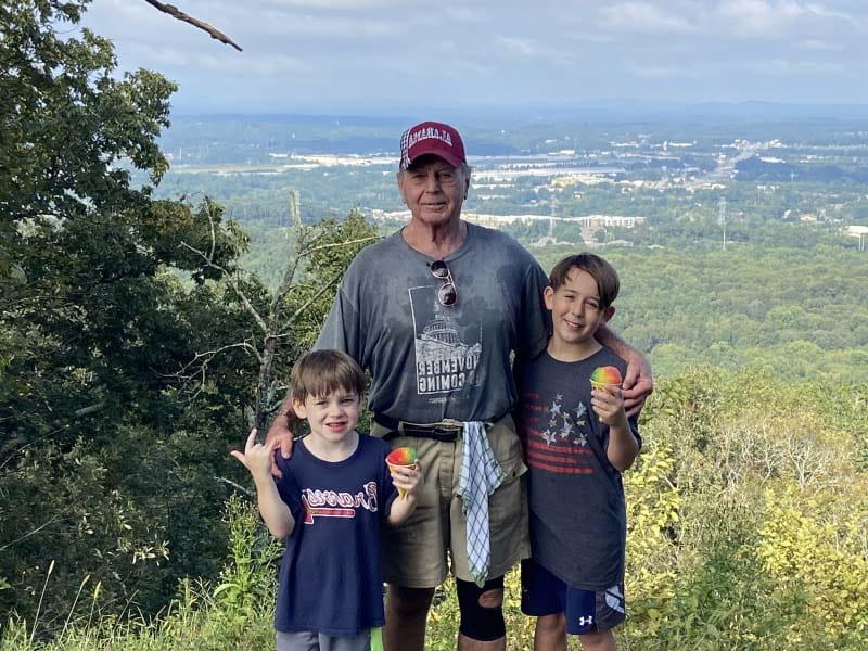 Bruce Dunning with grandsons Hudson, left, and Carter after hiking to the top of Kennesaw Mountain near Atlanta.